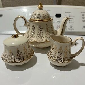 Elegant Gold and Cream Tea Set